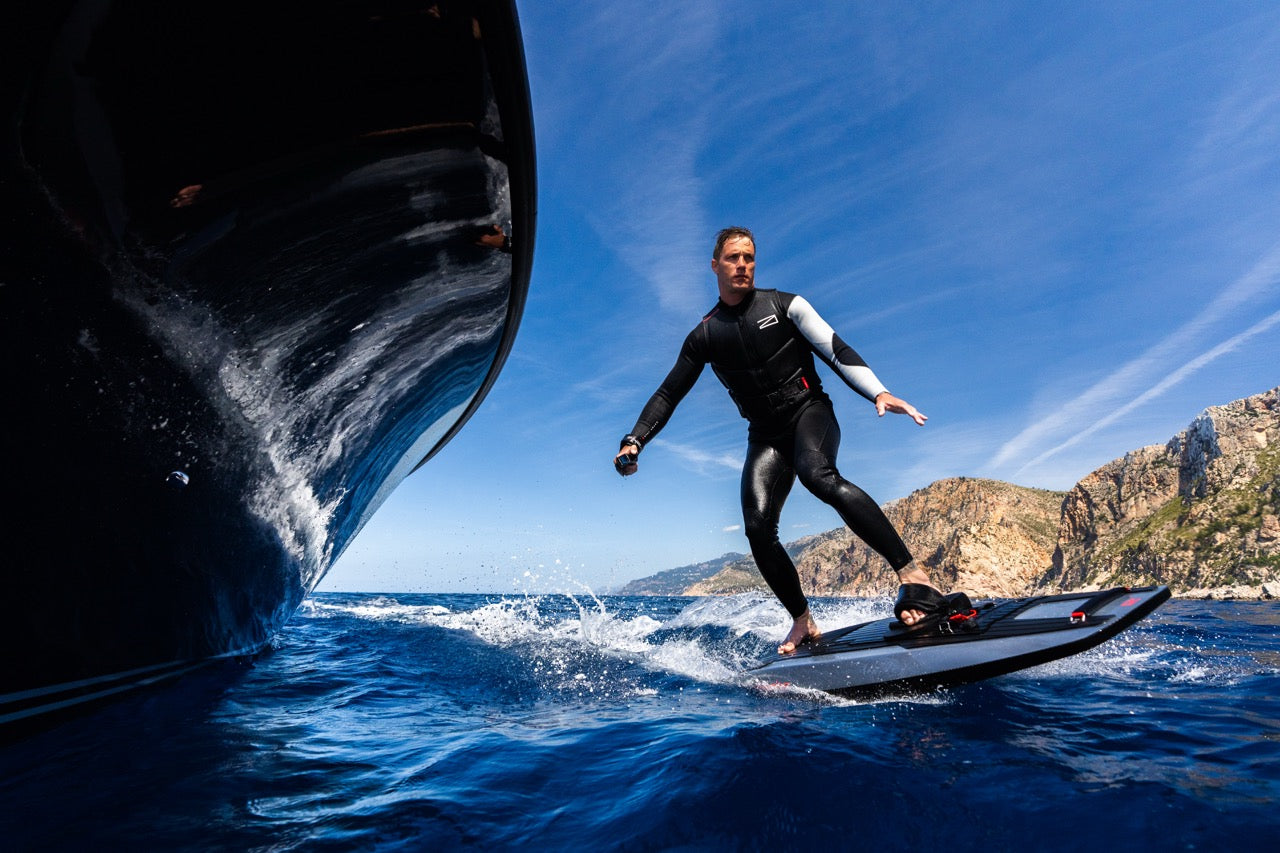 Awake RAVIK Adventure electric jetboard carving across the water. Image via Awake USA.